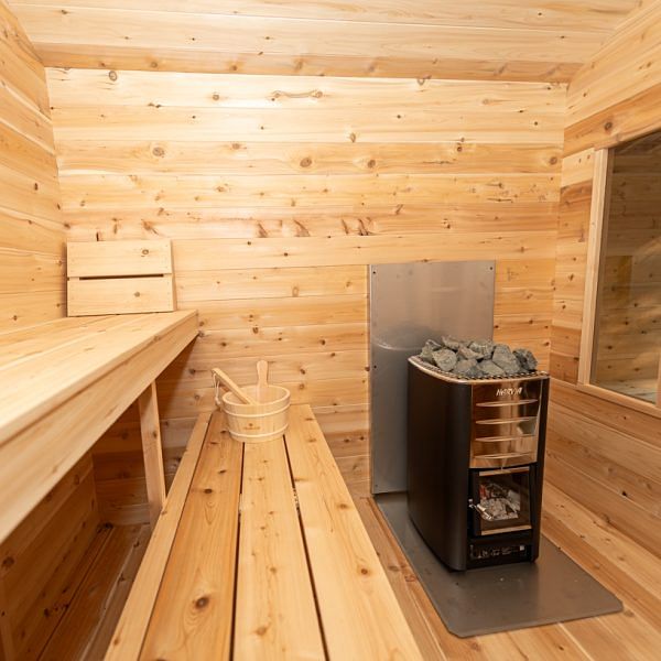 Dundalk CT Georgian Cabin Sauna with Changeroom 6 Person CTC88CW inside with heater