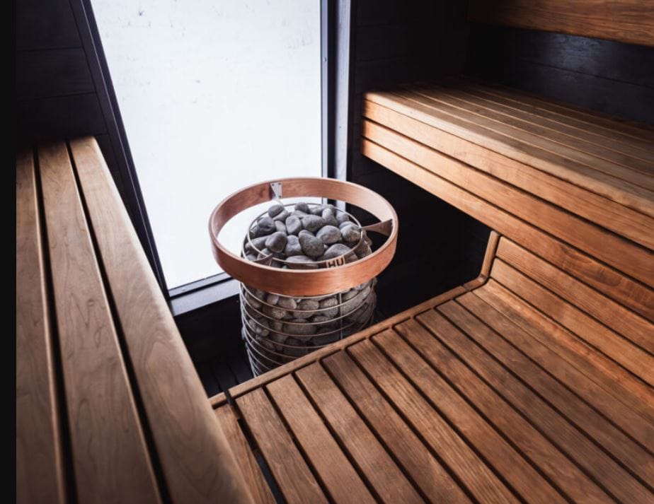 huum hive mini in background electric sauna heater